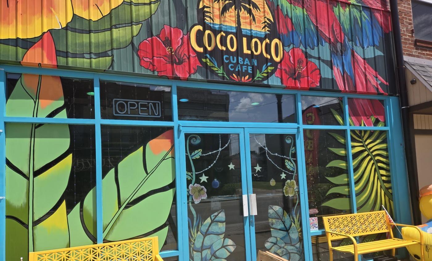 The hand painted tropical front of Coco Loco Cuban Cafe on Main Street in Boonville, Missouri